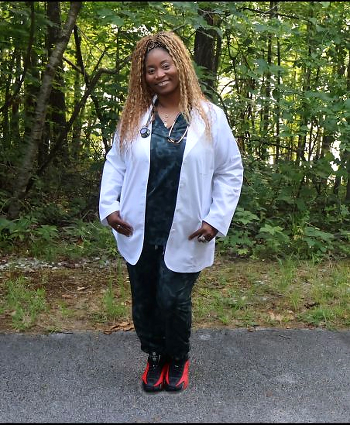 LaShounn Stevenson, RN, in lab coat